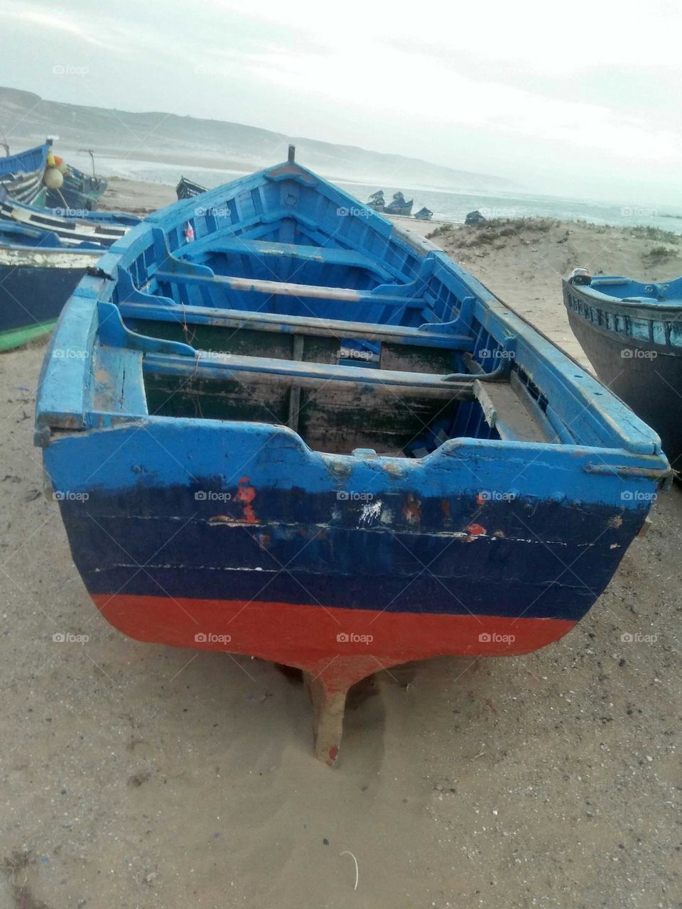 Blue boats near the beach at essaouira City in Morocco