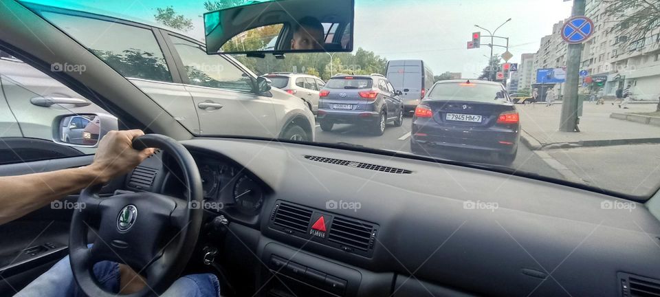 driver in car road window view summer time