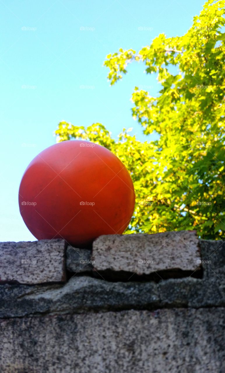 Ball on a ledge