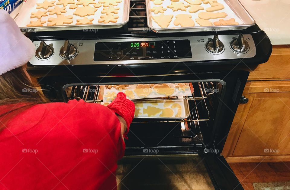 Woman baking Christmas cookies for her family