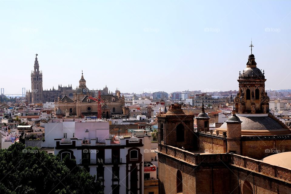 View across the rooftops of Seville, Spain towards the cathedral
