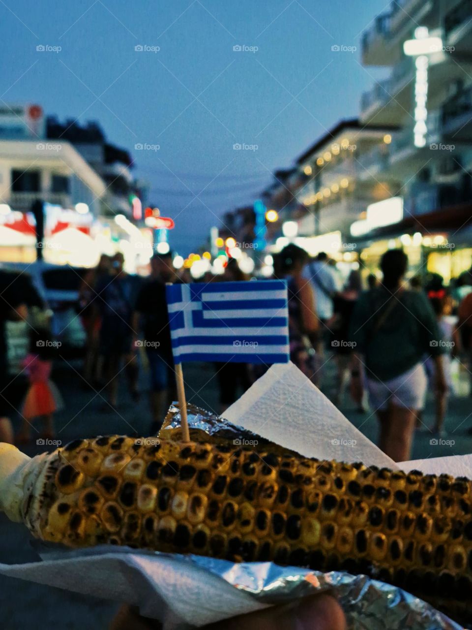 flag of greece on ripe corn