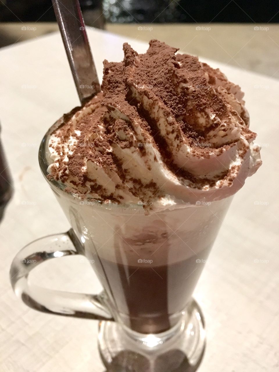 Cup of hot chocolate with whipped cream 