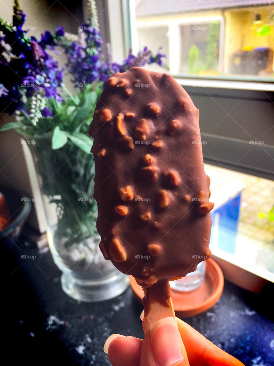 an ice cream by the window. Europe's summers are very cool, but I also love ice cream in such weather