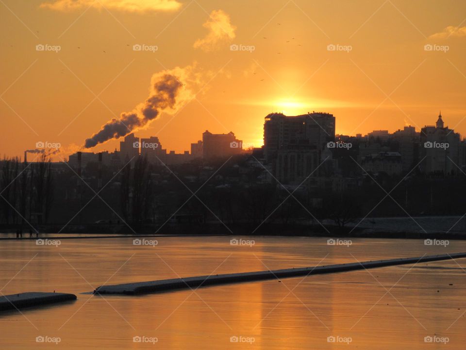 sunset in the city of Voronezh, the first frosts, thin ice