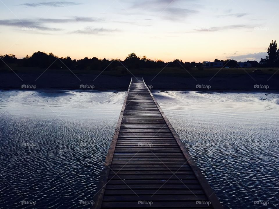 Brigde at the Beach by sunset . Walking at the Beach in Copenhagen - With my dog Coco 