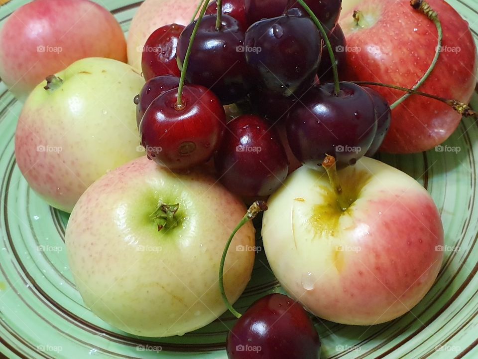 yummy cherries and apples closeup
