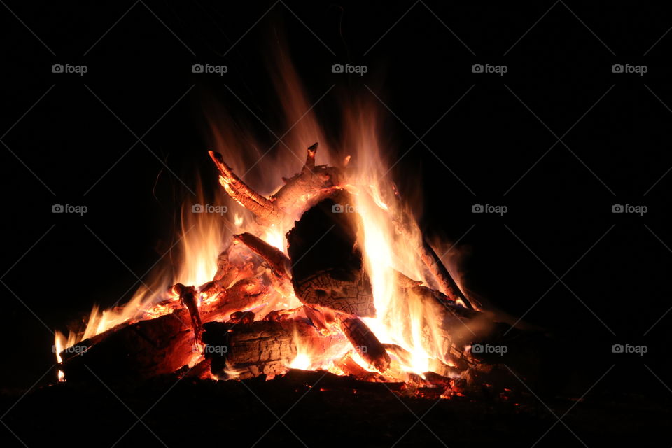 A warm roaring fire for roasting at night