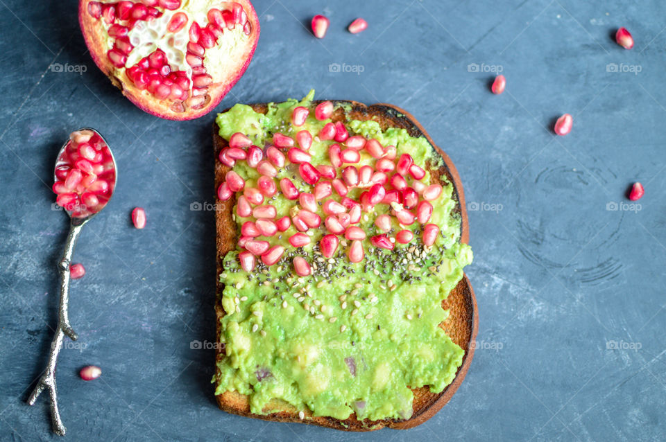 Healthy and delicious avocado spread with pomegranates is our favourite on brown bread. Never skip a breakfast.