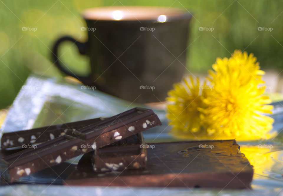 A cup of coffee and chocolate