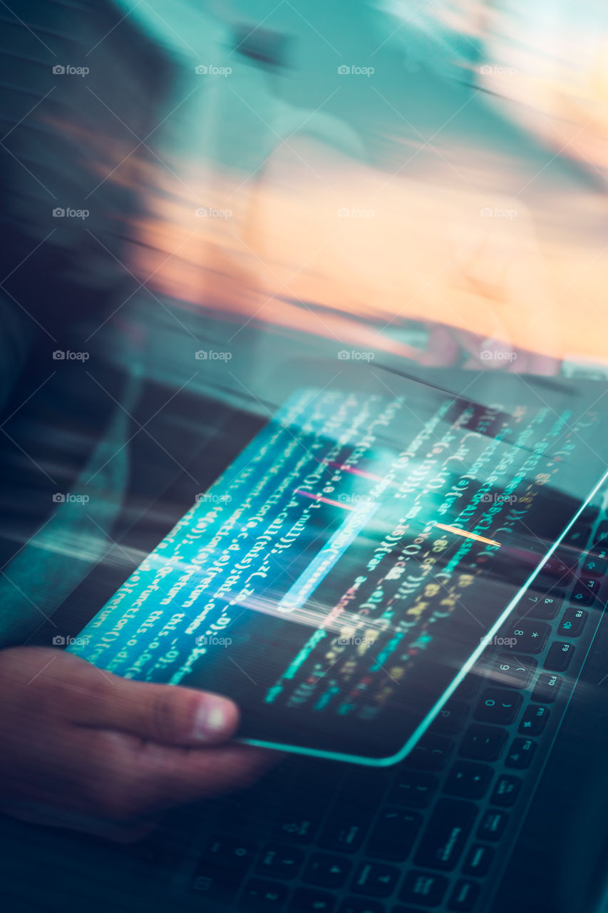 Hacker using computer, smartphone and coding to steal password and private data. Screen displaying program code, website development, application building, password and private data