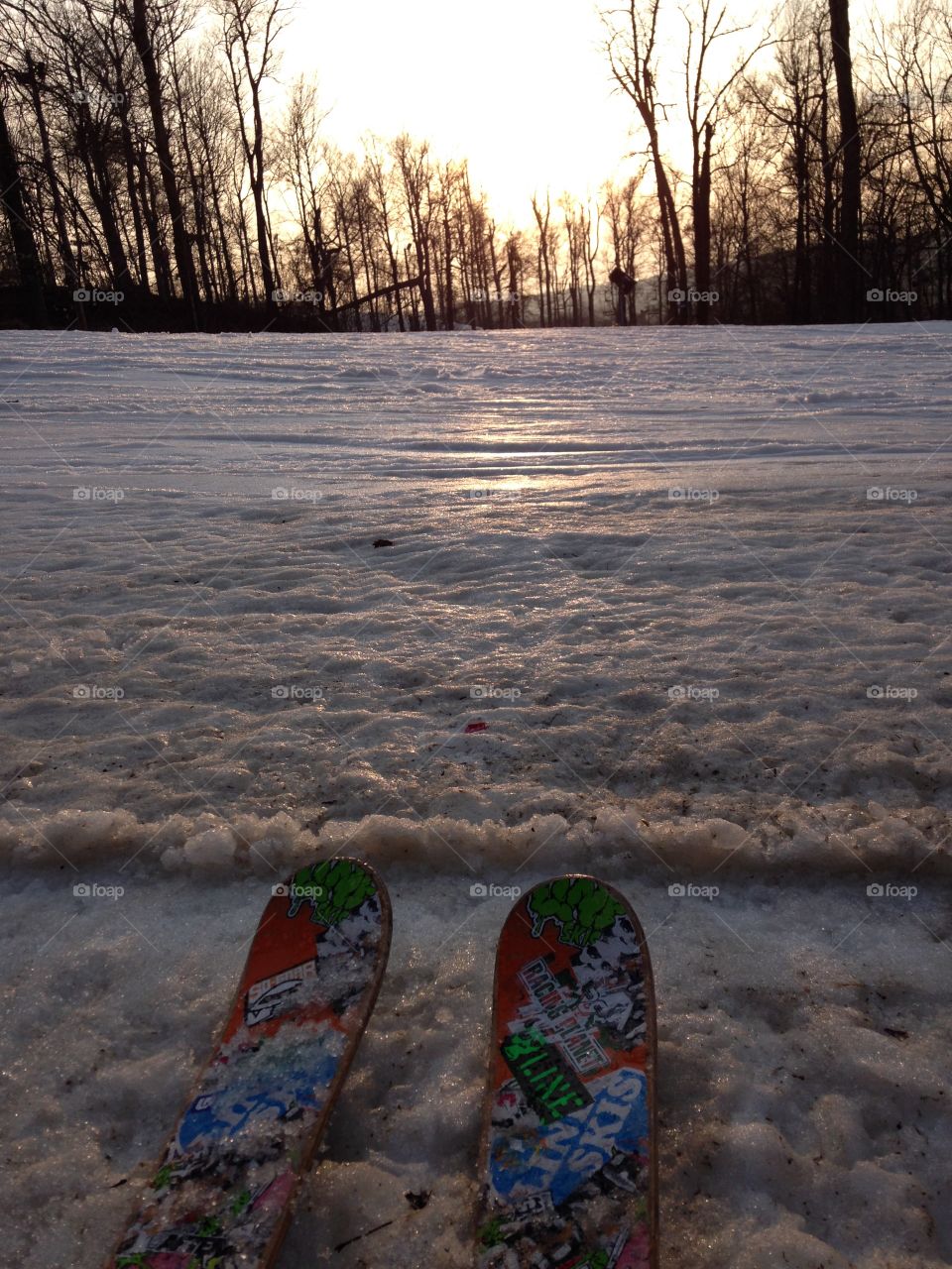 Skiing at dusk. Skiing at dusk as the sun sets