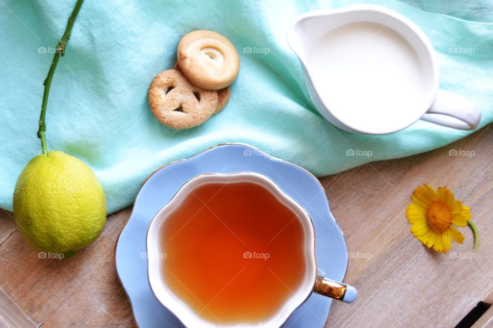 Tea time with cookies and lemon