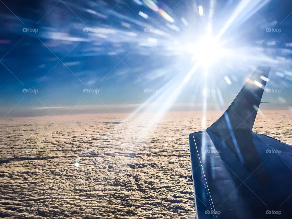 Sky view out the private jet window 