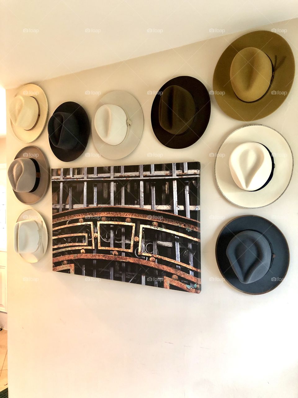 Home design statement wall, hat wall featuring Goorin Bros fedoras