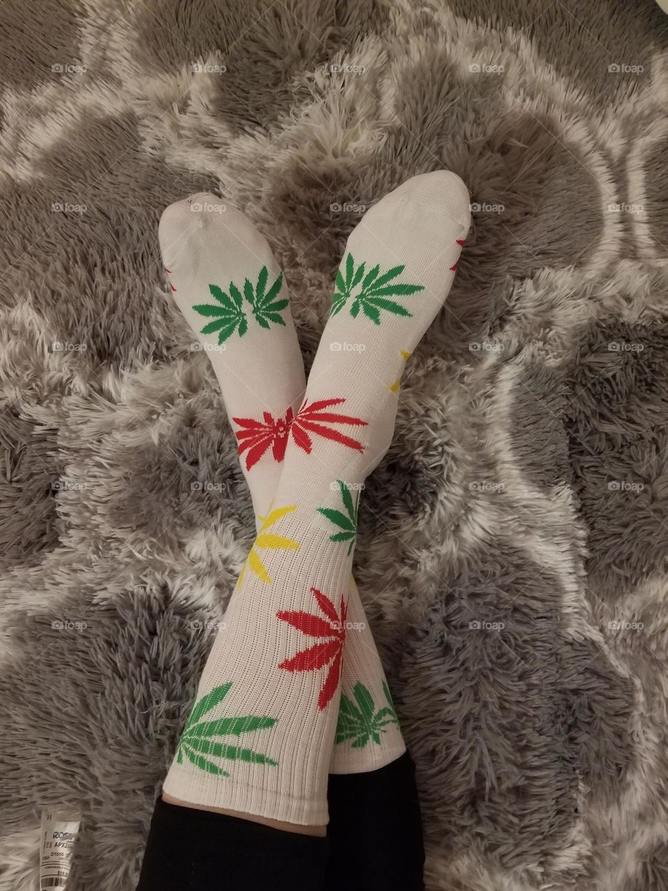 Popfizzy White and Rasta colored weed socks.