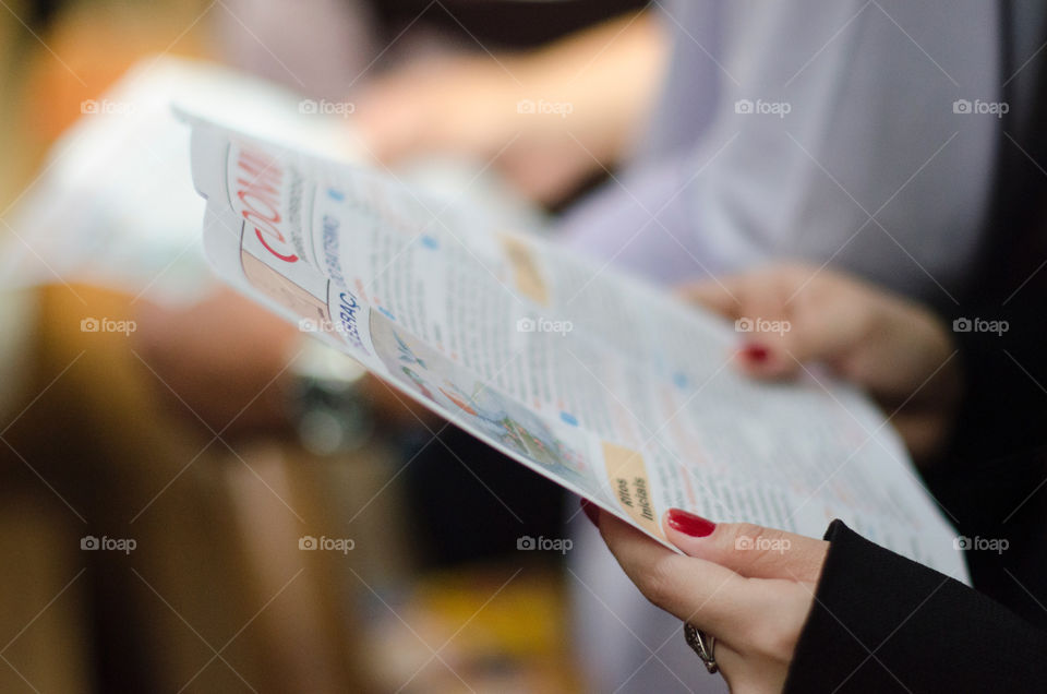 Woman reading a newspaper 