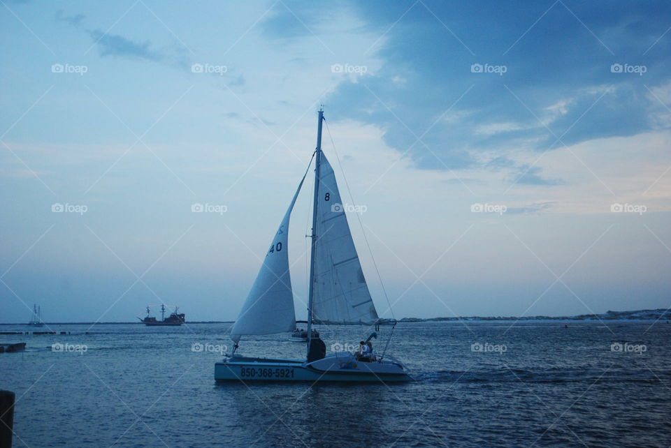 A sailing boat in the ocean