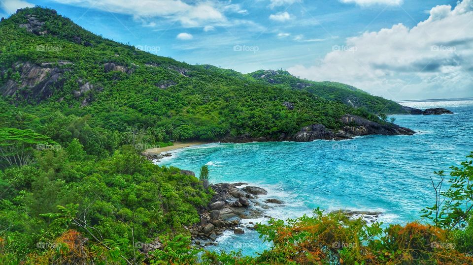 Hiking in the mountains of Seychelles We come across a beautiful secluded Beach and spend the rest of the day there.