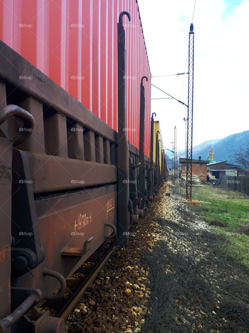 a cargo truck loaded with containers