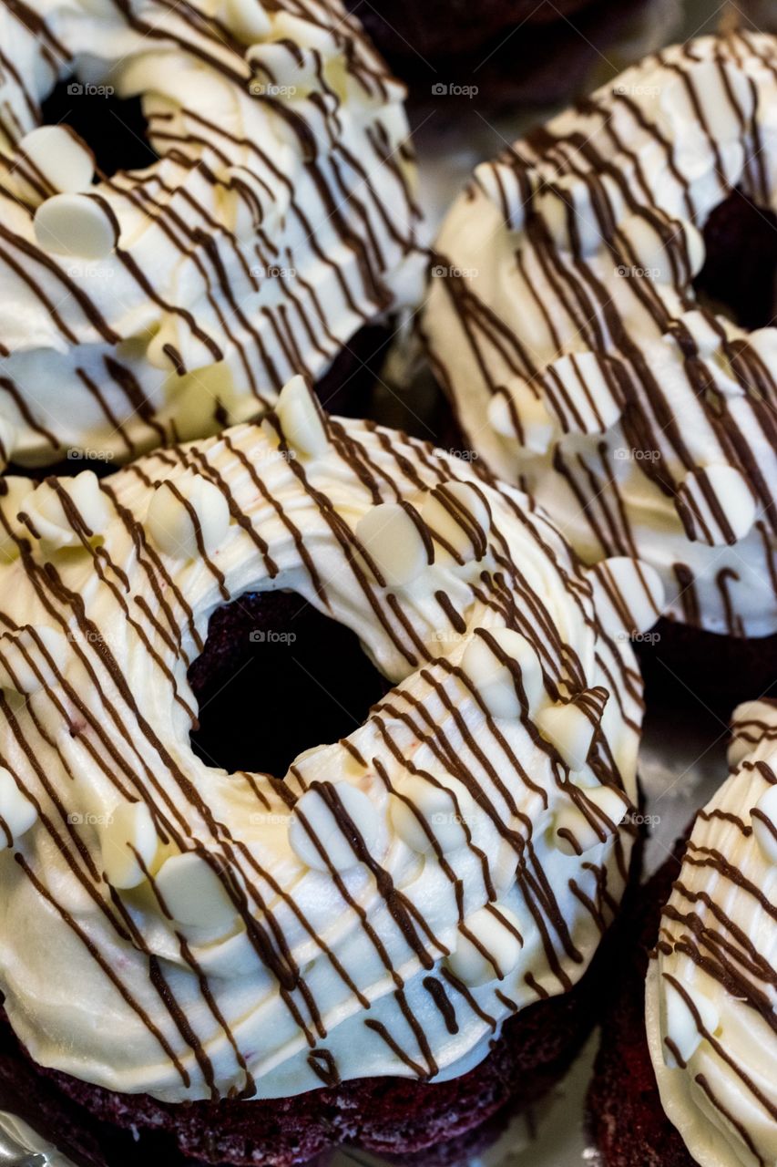 Donuts frosted with white chocolate chip 