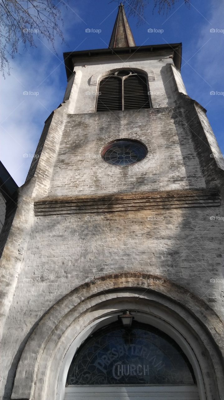 An abandoned Presbyterian church sits in an Indiana neighborhood.