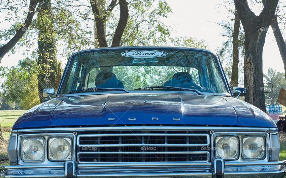 Front end of a vintage blue Ford Falcon