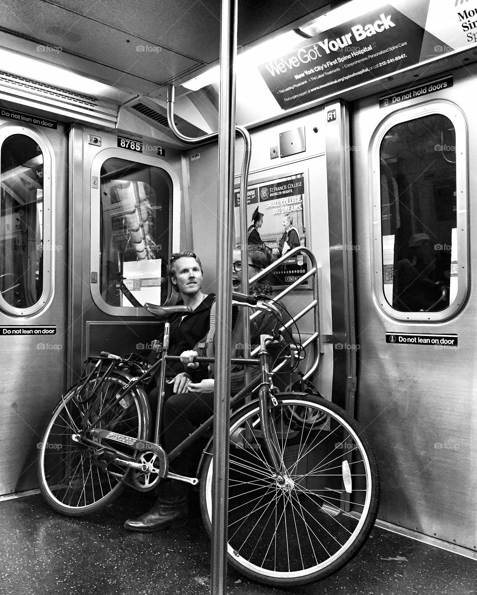 Cyclists on the New York subway