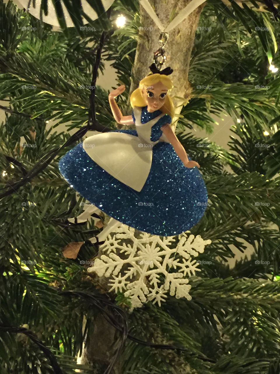 Snowwhite sitting in the Christmas tree