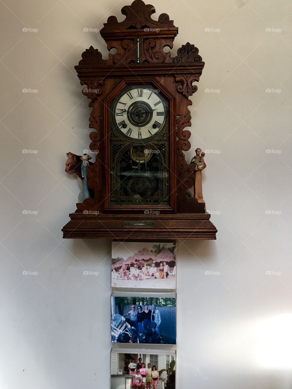 Gingerbread Clock hanging on wall, with fun photos over the years!