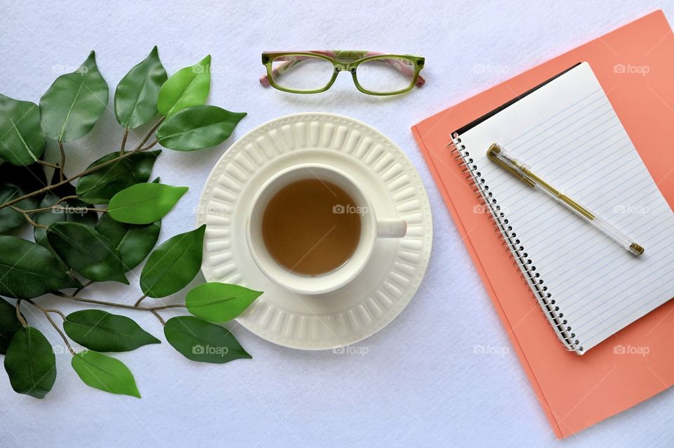 Tea for morning preparation of to-do list today’s agenda of what to do around the house. 