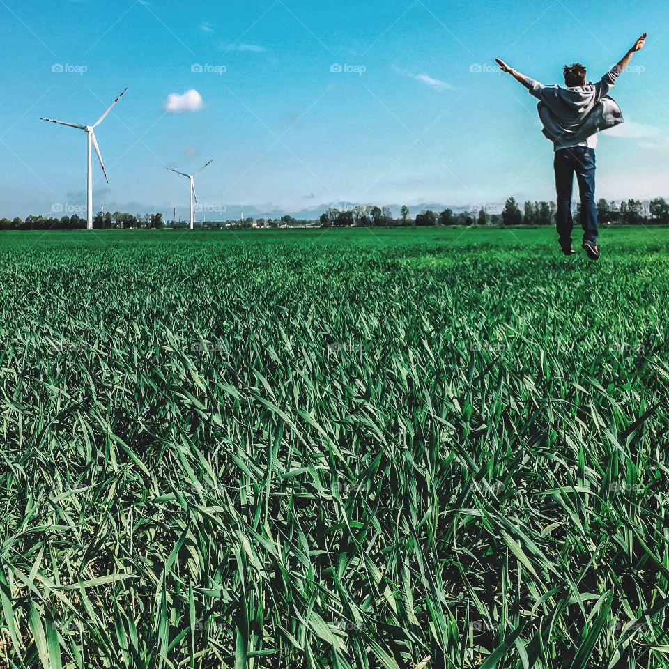 Happy man on green grass