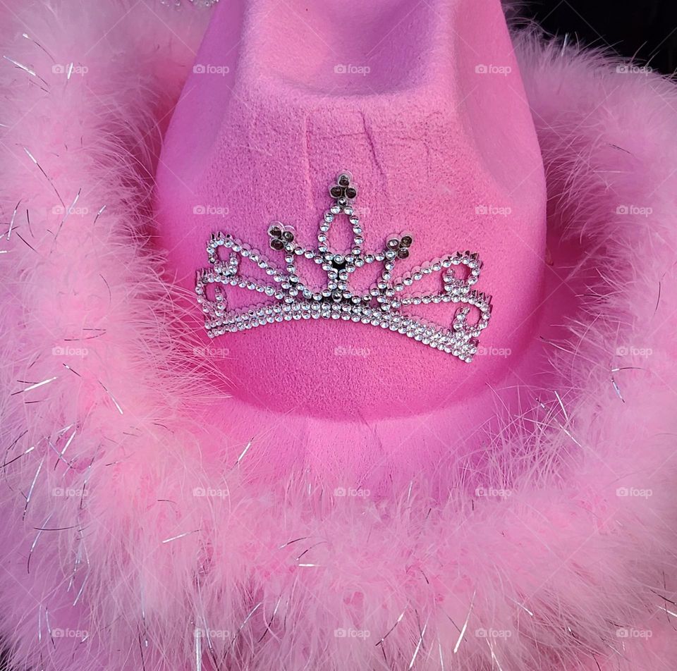 This pink princess tiara cowgirl hat from the county fair has all the sparkling style of Barbie glam.