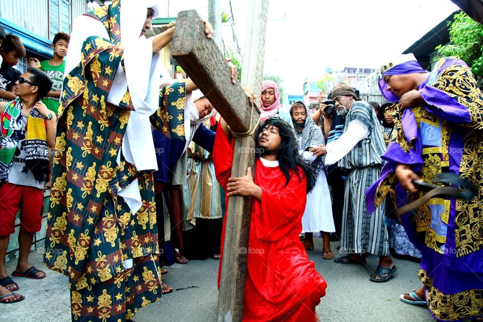 catholic devotees reenact the death of jesus christ on good friday during holy week in cainta, rizal, philippines, asia