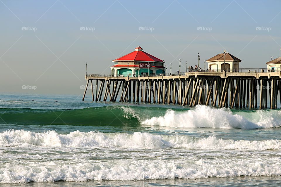 Tourists on pier at Huntington beach, Los Angeles