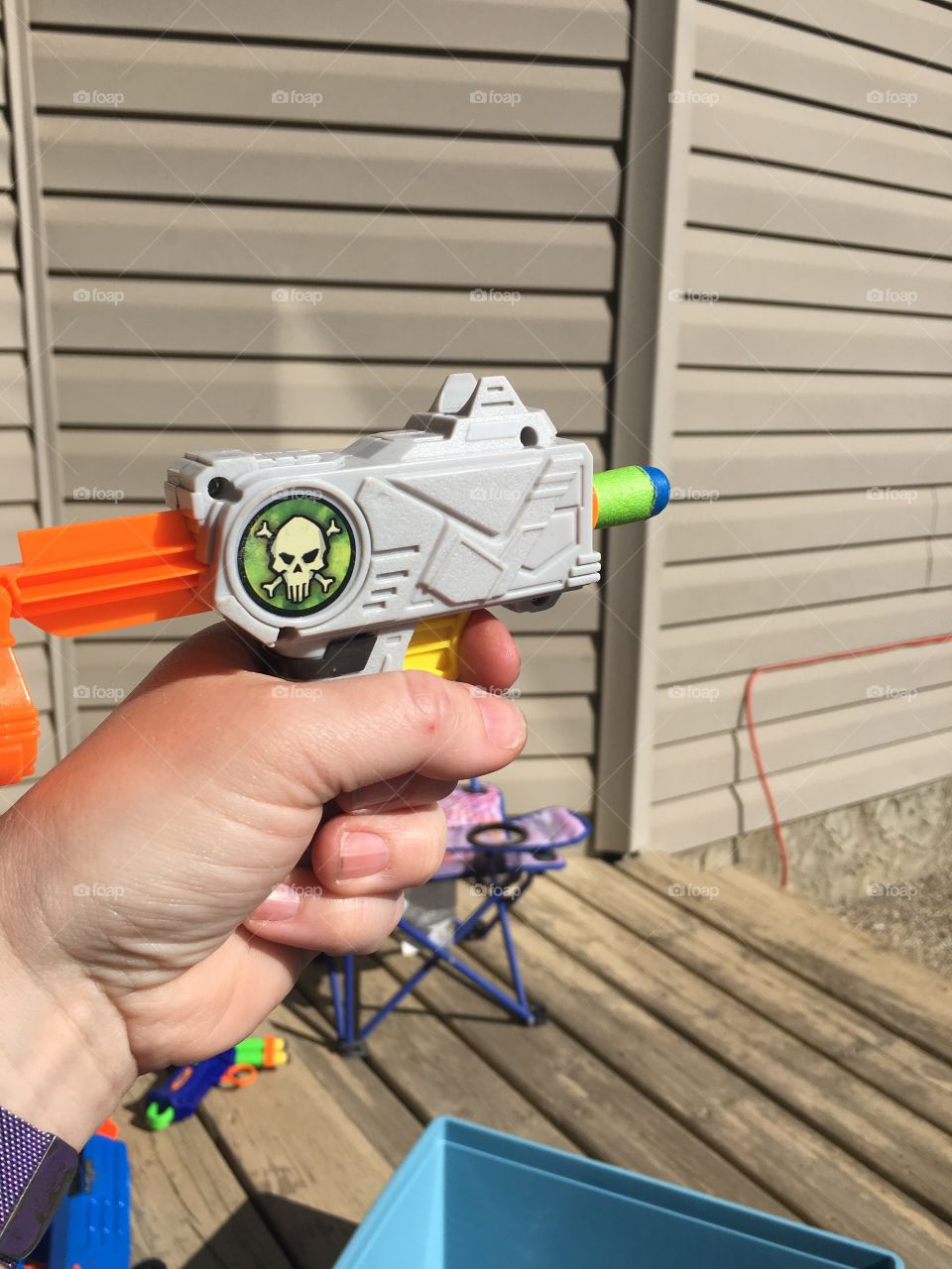 Playing with a nerf gun 