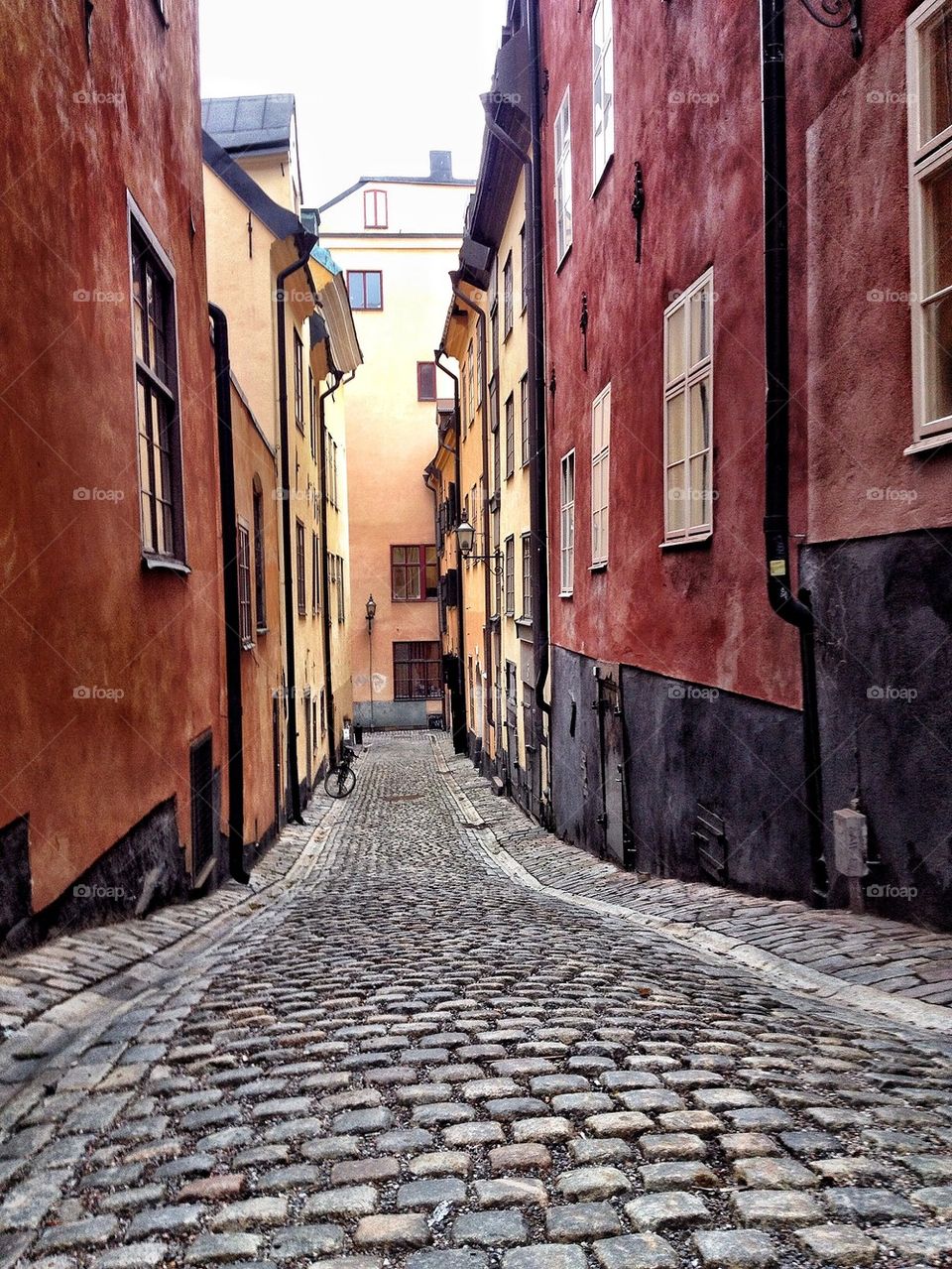 Narrow winding cobblestone street in Stockhom