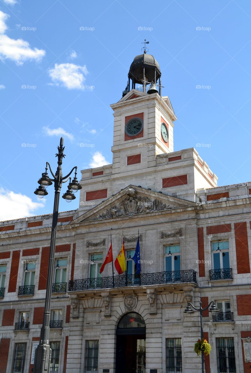 Puerta del Sol in Madrid. View of the building and clock of the famous Puerta del Sol in Madrid, Spain
