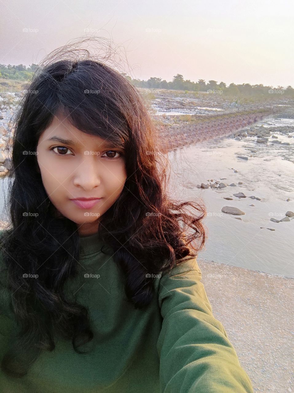 Me taking selfie with a scenary.