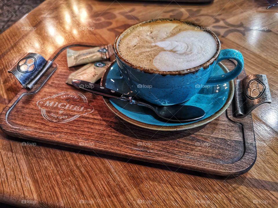 Coffee table served eat tasty view day outdoor outside street capture cafe restaurant