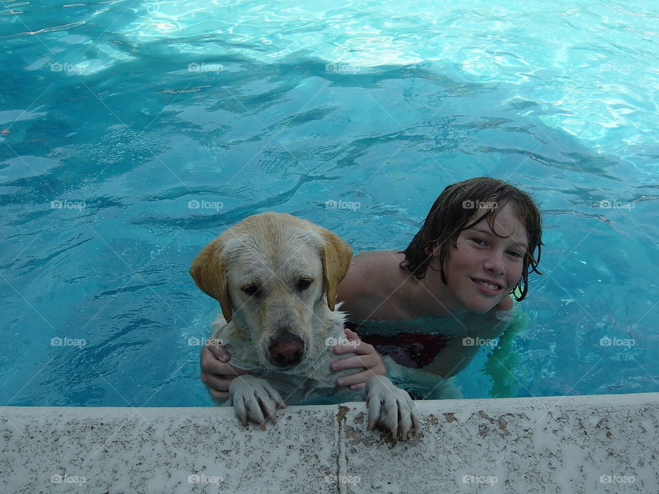 Play time. My nephew and my swimming dog