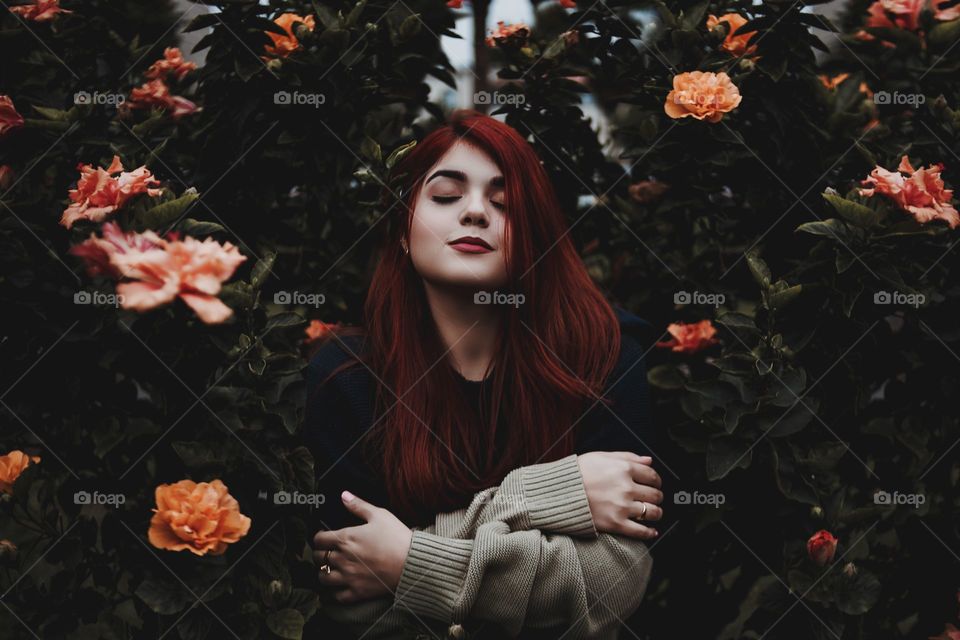 Red hair. Outdoors. Girl. Amazing. Flowers.