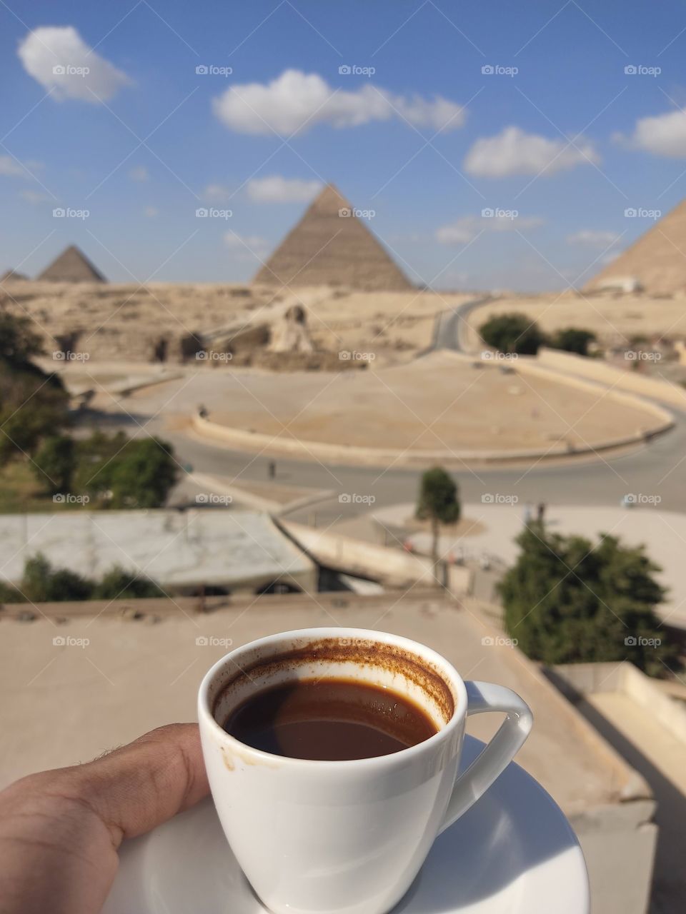 a great day in Great Giza Pyramids morning drinks coffee & and Egyptian tea with mint 
this is Egyp .