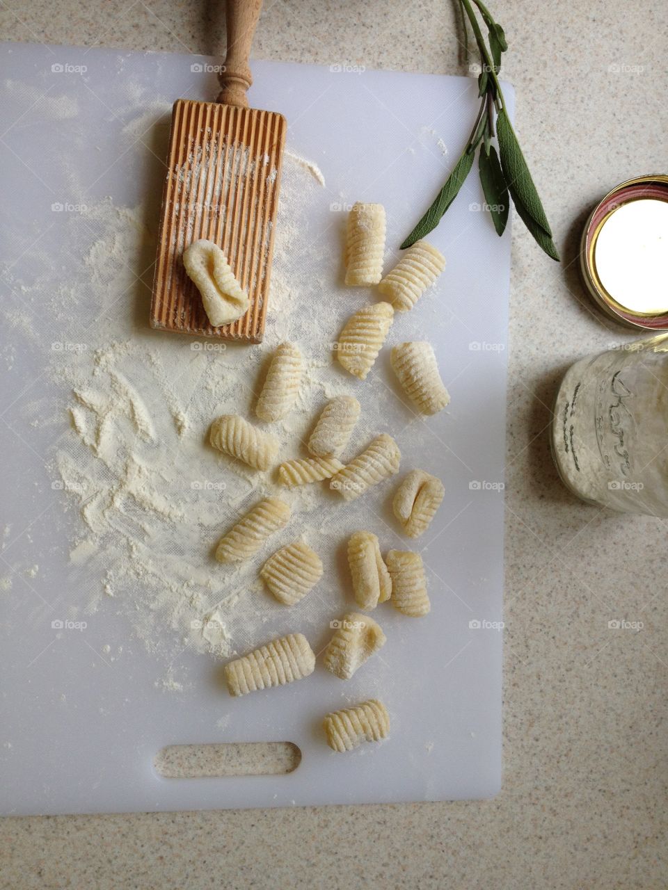 Making homemade gnocchi. Dropping them into a butter sage sauce afterwards. Yumm!