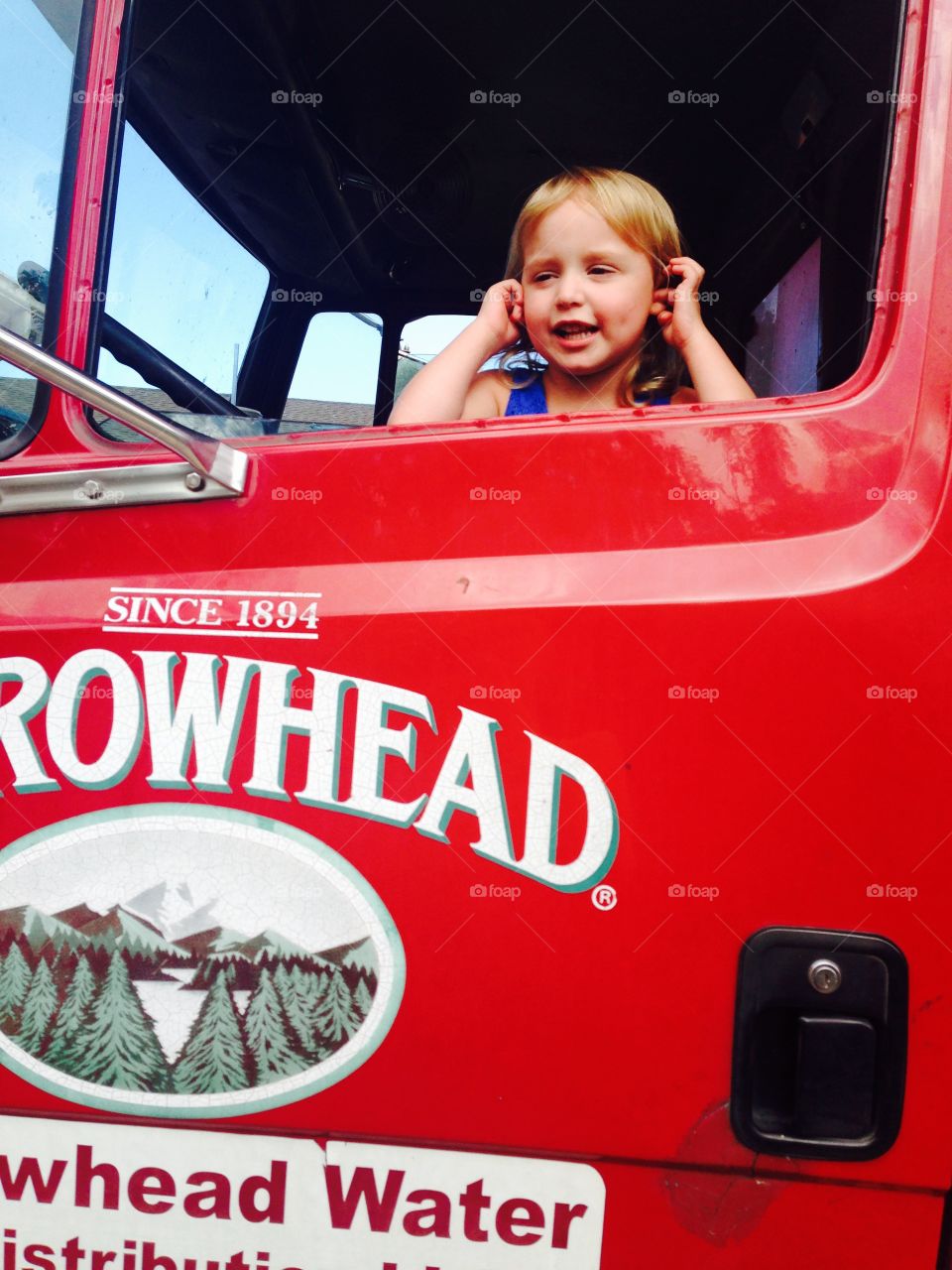 Arrowhead driver . My daughter in my uncle's work truck. 
