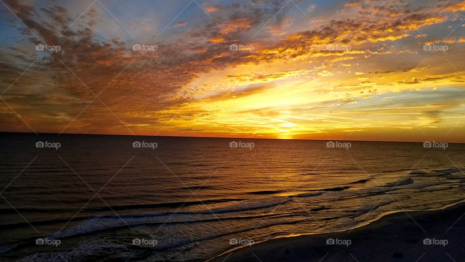 Florida sun setting over the ocean