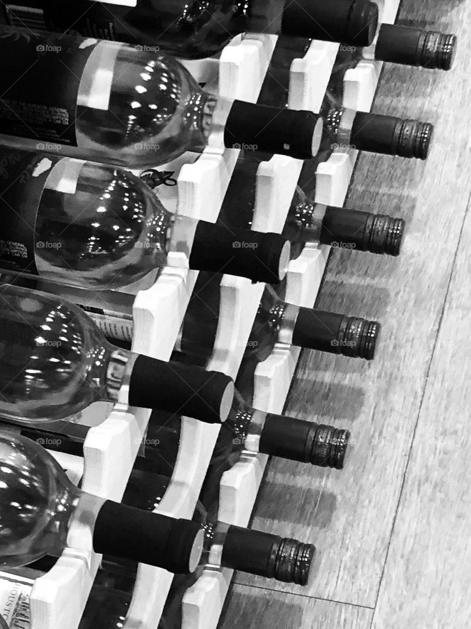 Multiverse. Black and white of rows of wine bottles 🍷