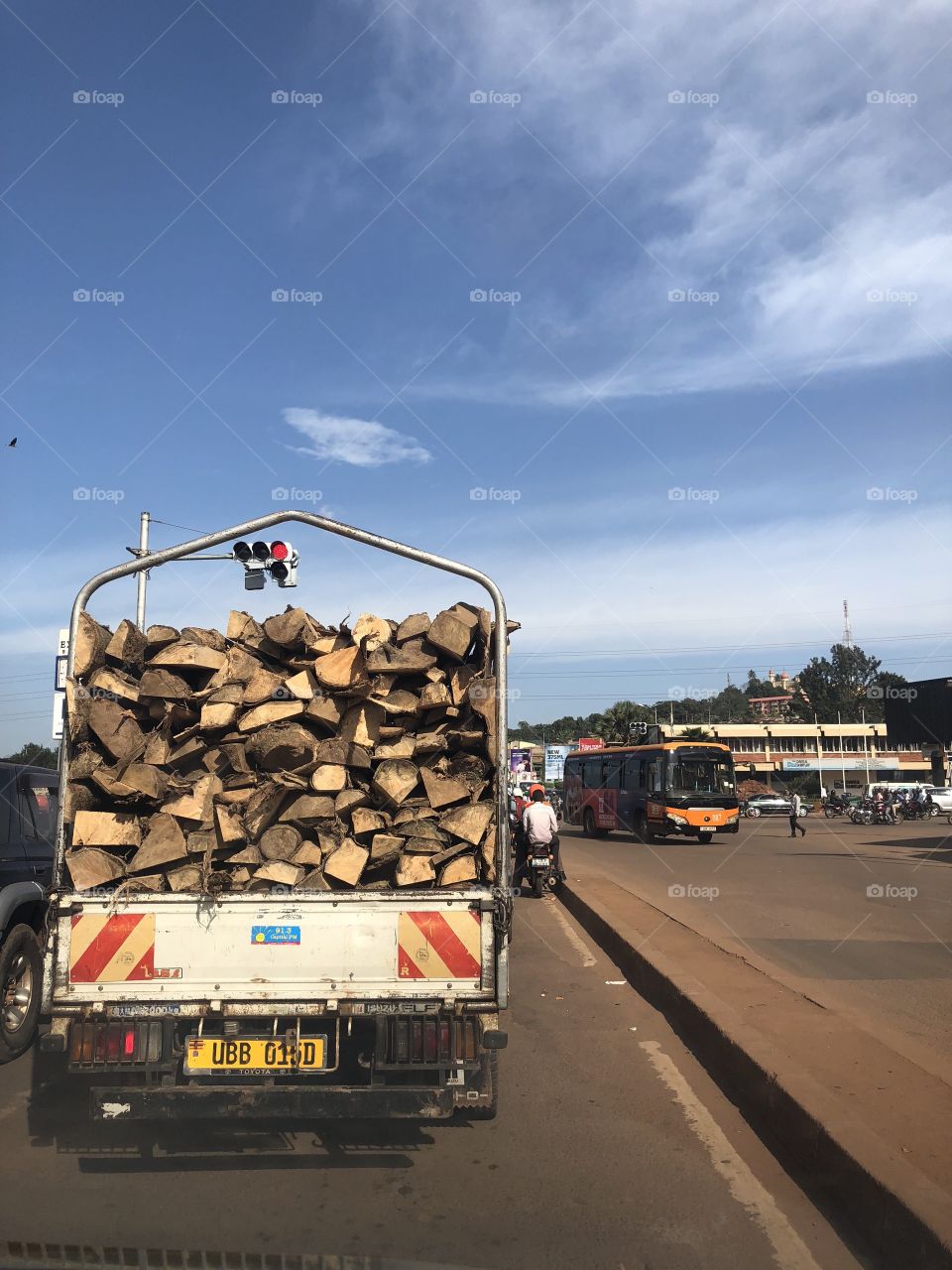 Best African hood . Timber , Uganda hood . Uganda pick up . UBB number plate in Uganda is new . The sky is so blue in Uganda today 
