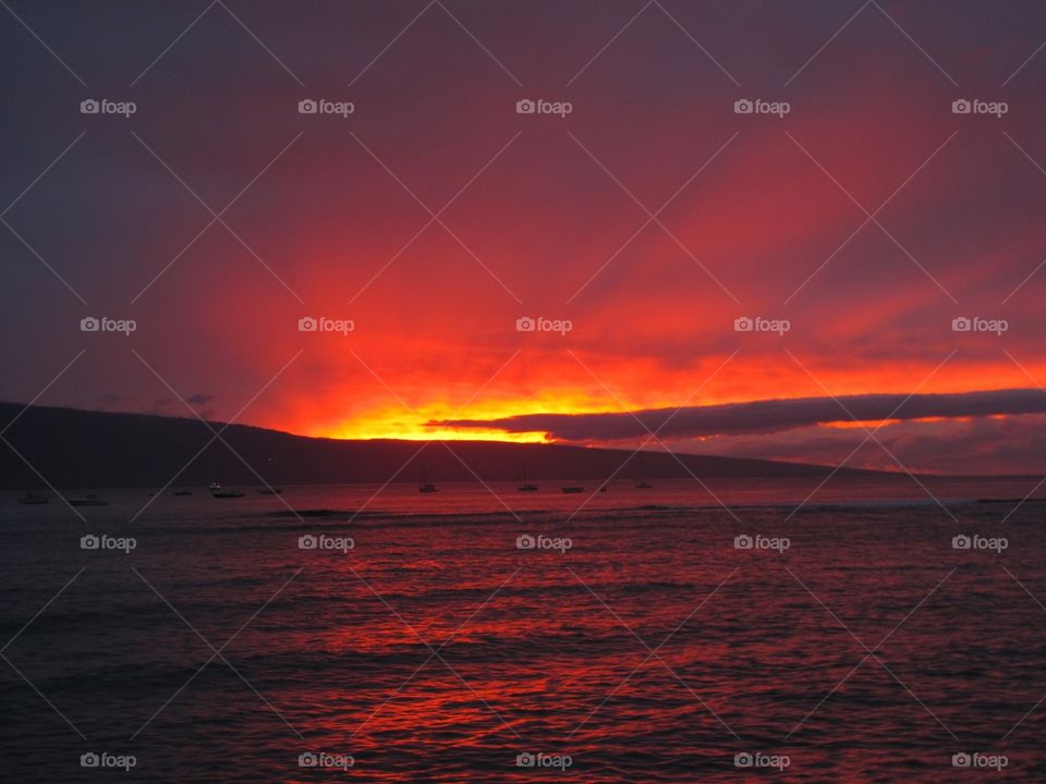 View of sea against dramatic sky