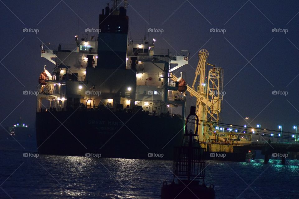 Ship at harbour at night